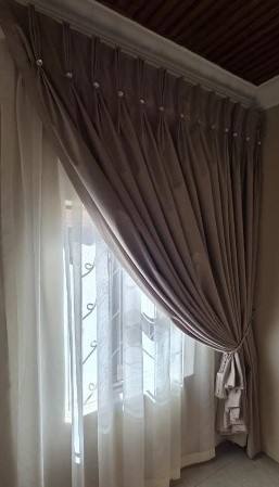 Curtains by Linric Blinds