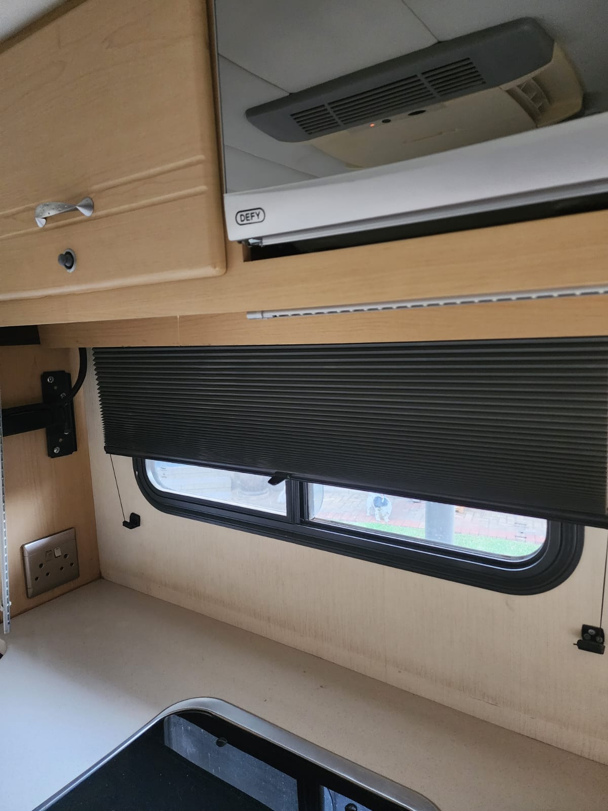 Caravan blind in pleated fabric by Linric Blinds